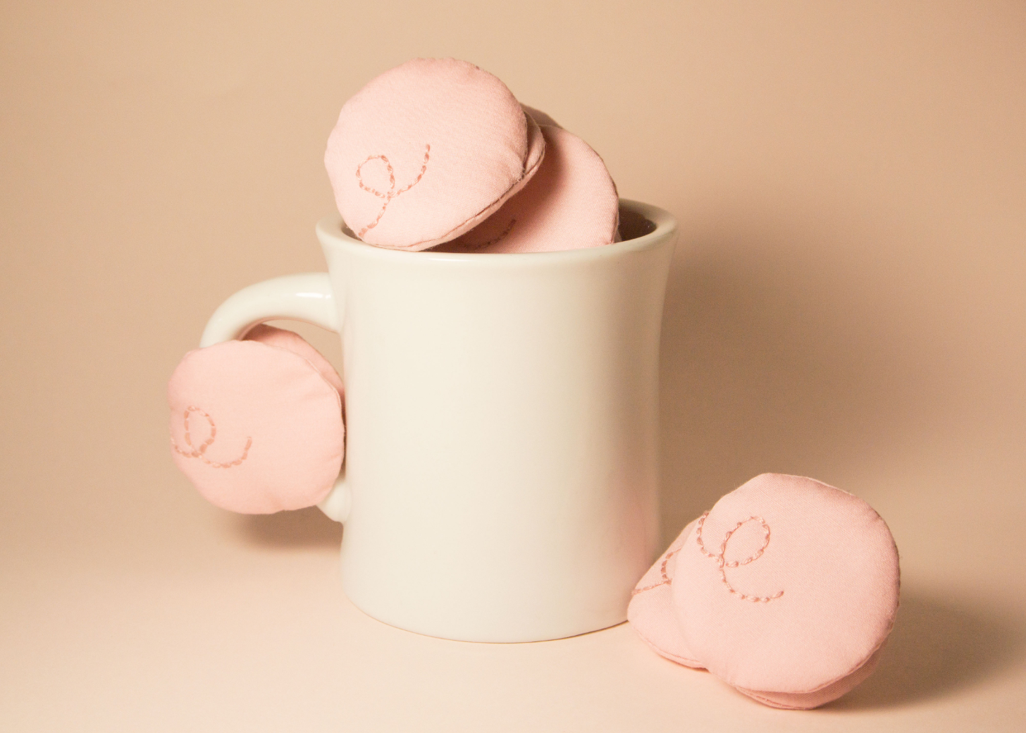 Piggiesのマグハンドルカバーのデザイン